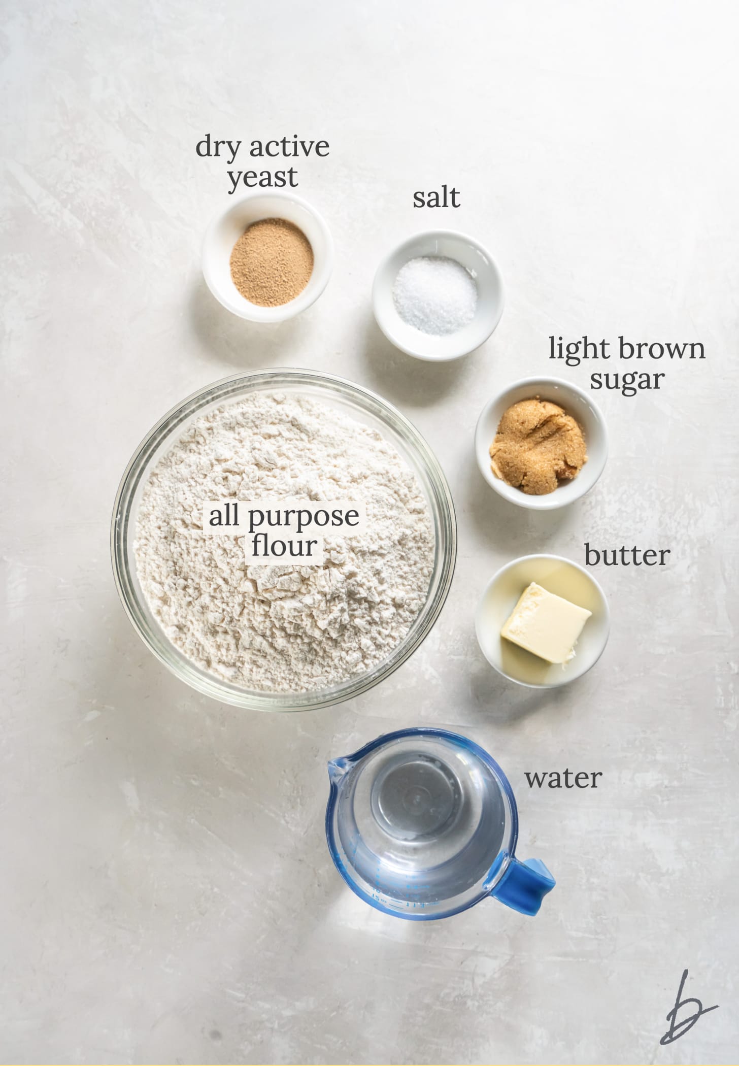 soft pretzel ingredients in bowls labeled with text.