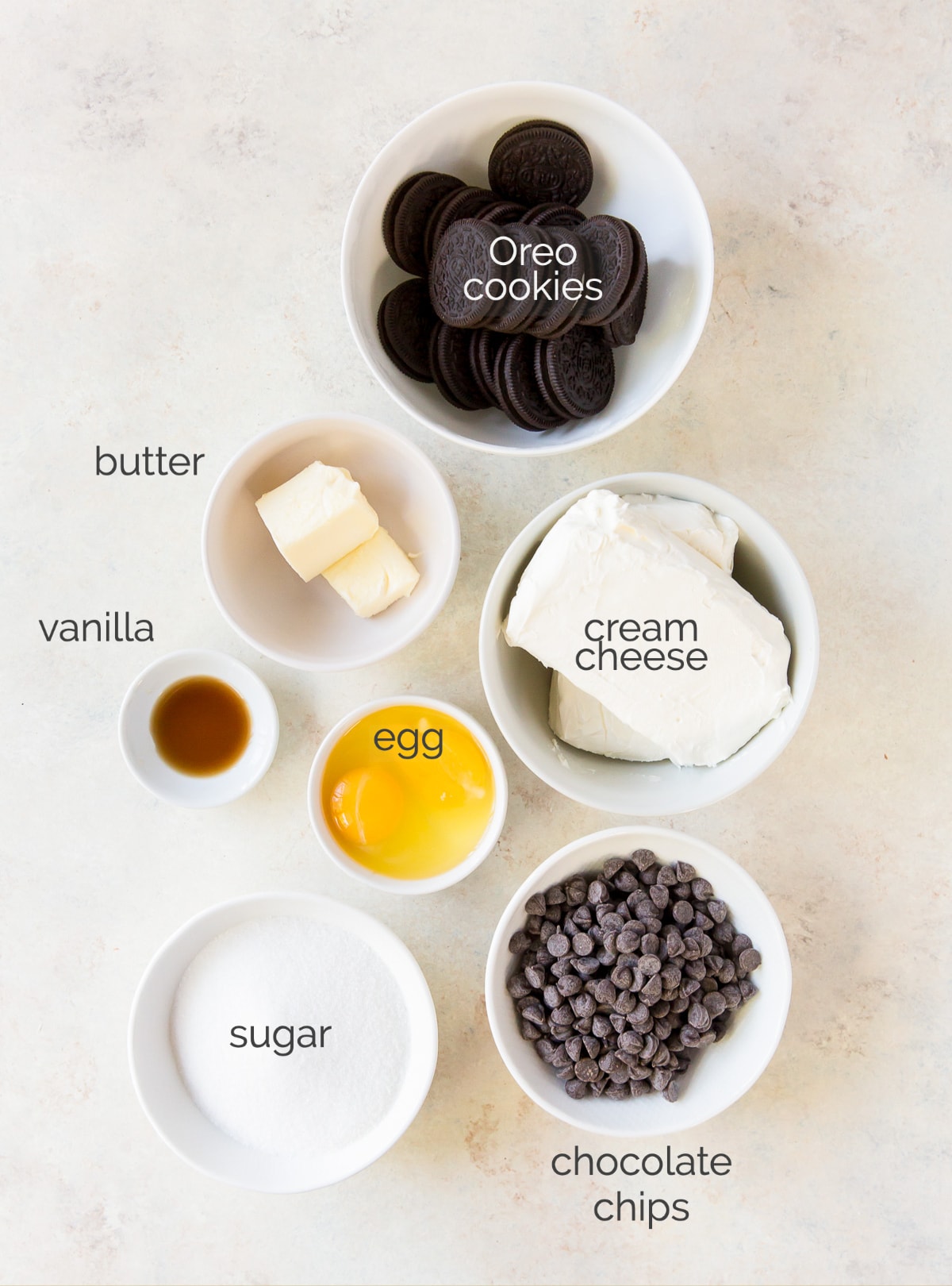 chocolate cheesecake ingredients laid out on a table.