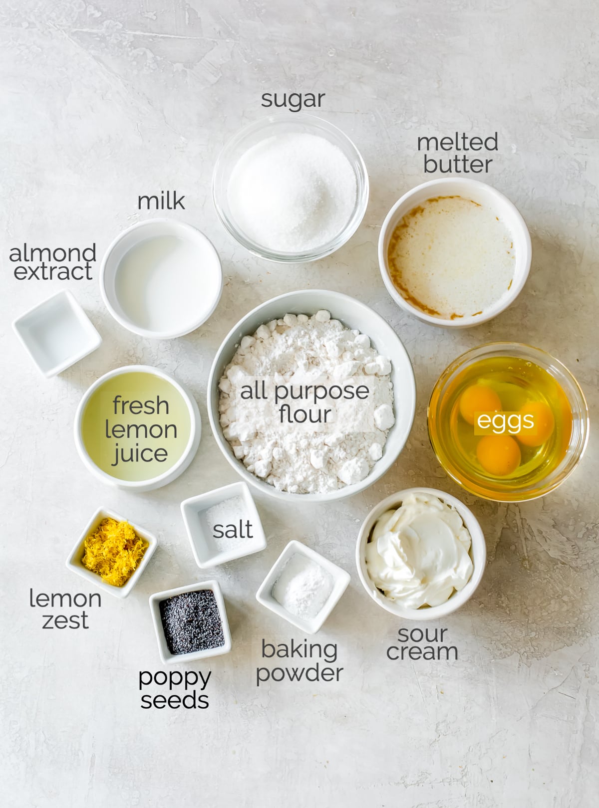 lemon poppy seed muffins ingredients in bowls