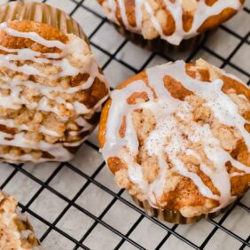 coffee cake muffins with streusel and icing on top