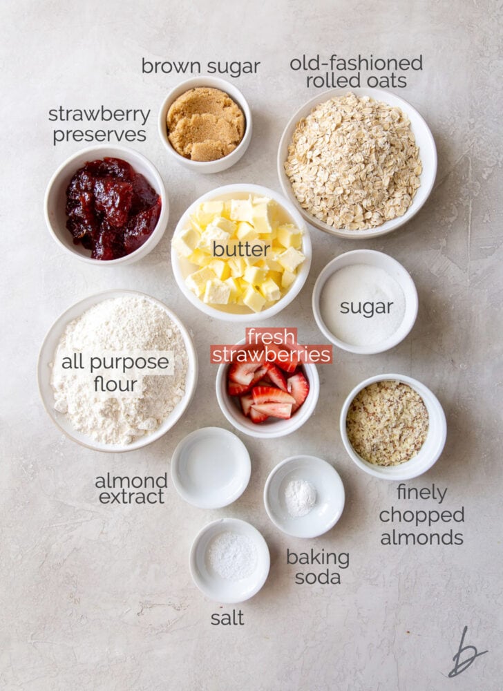 strawberry oatmeal bars ingredients in bowls with text
