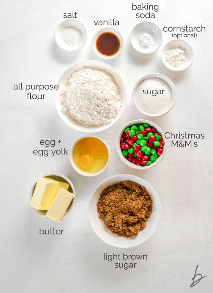 m&m christmas cookies ingredients in bowls labeled with text