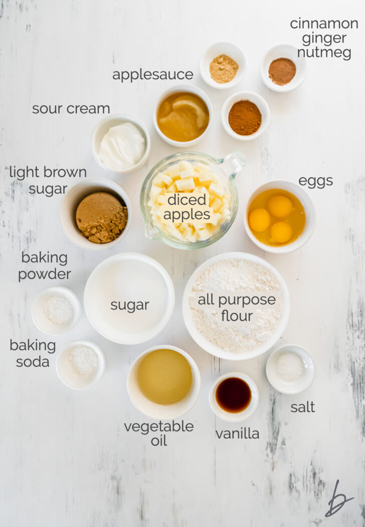 apple spice cake ingredients in bowls labeled with text