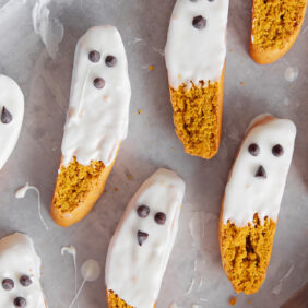 white chocolate dipped pumpkin biscotti to look like ghosts