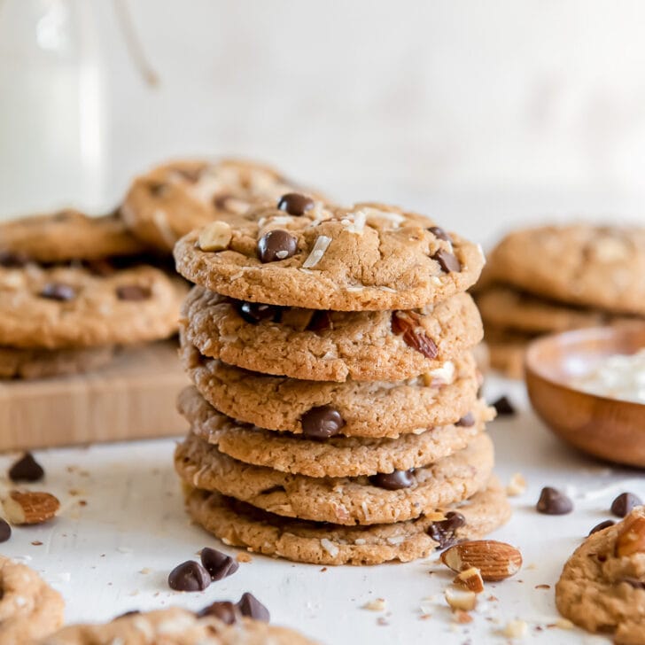 stack of almond butter cookies with chocolate chips and coconut