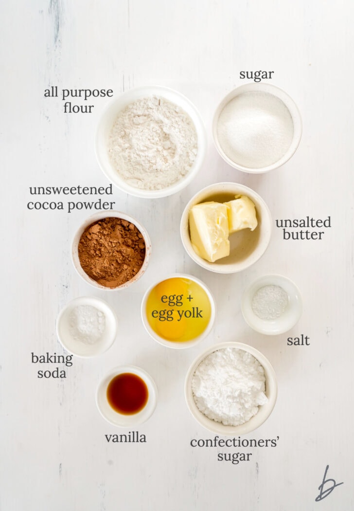 chocolate crinkle cookies ingredients in bowls labeled with text