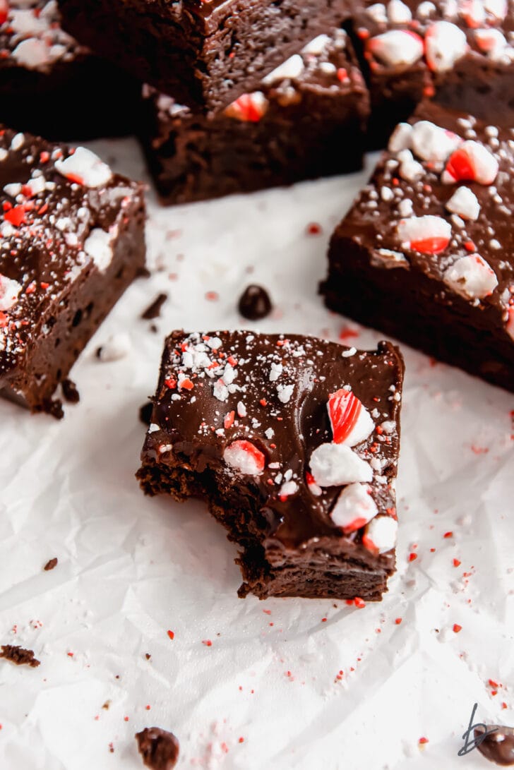 chocolate peppermint brownies with a bite taken out of it