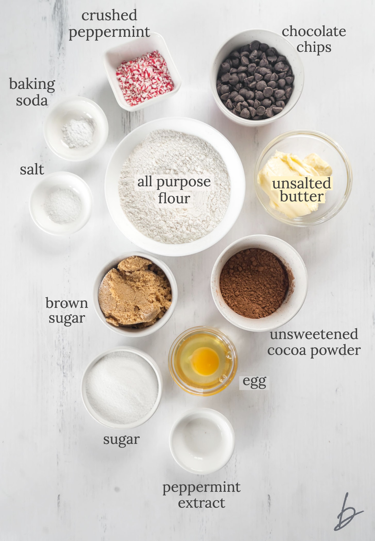 double chocolate peppermint cookies ingredients in bowls labeled with text.