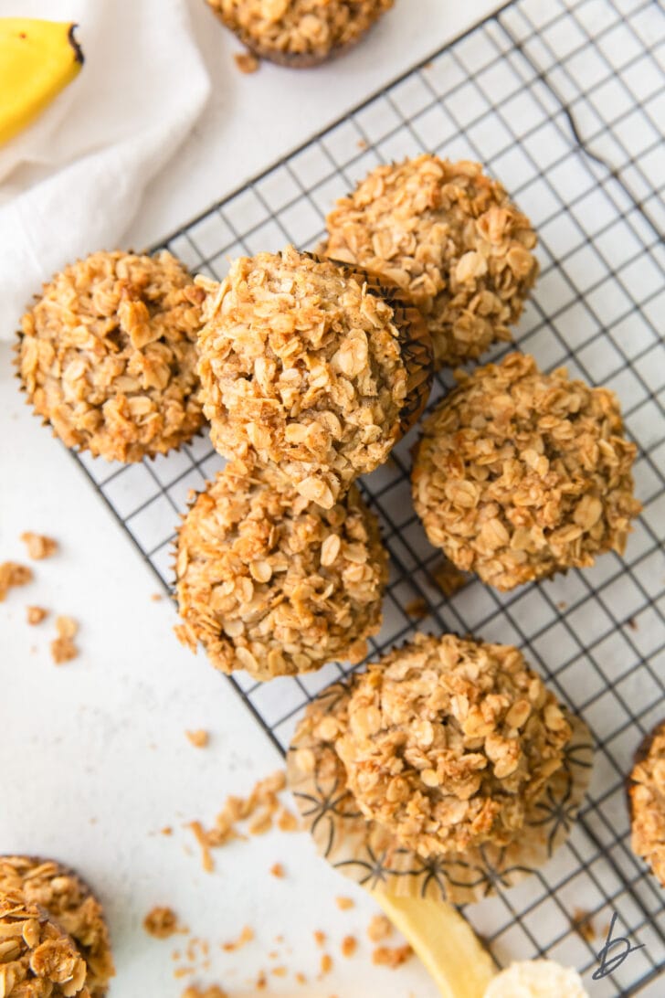 banana oatmeal muffins with streusel on wire cooling rack