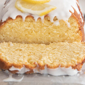 lemon pound cake with slice cut off the end of the loaf