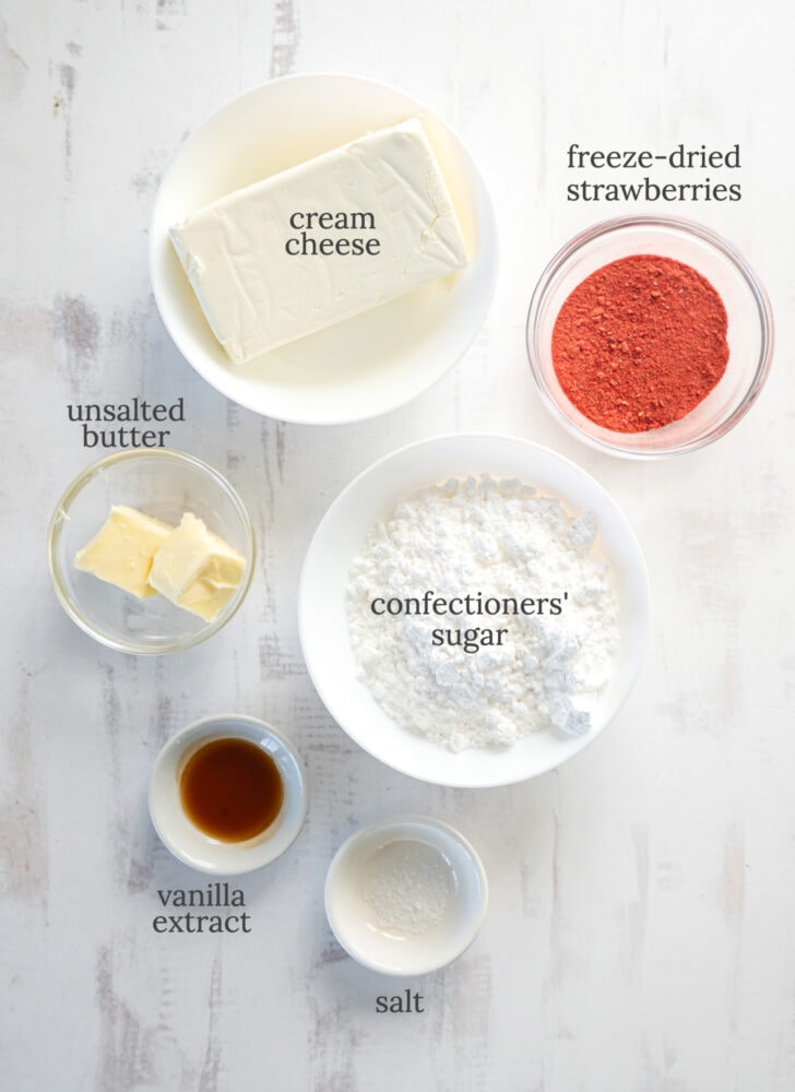 strawberry cream cheese frosting ingredients in bowls labeled with text