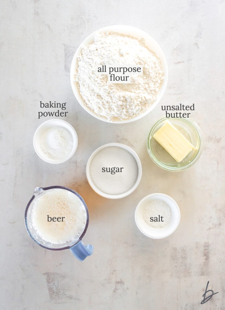 beer bread ingredients in bowls labeled with text