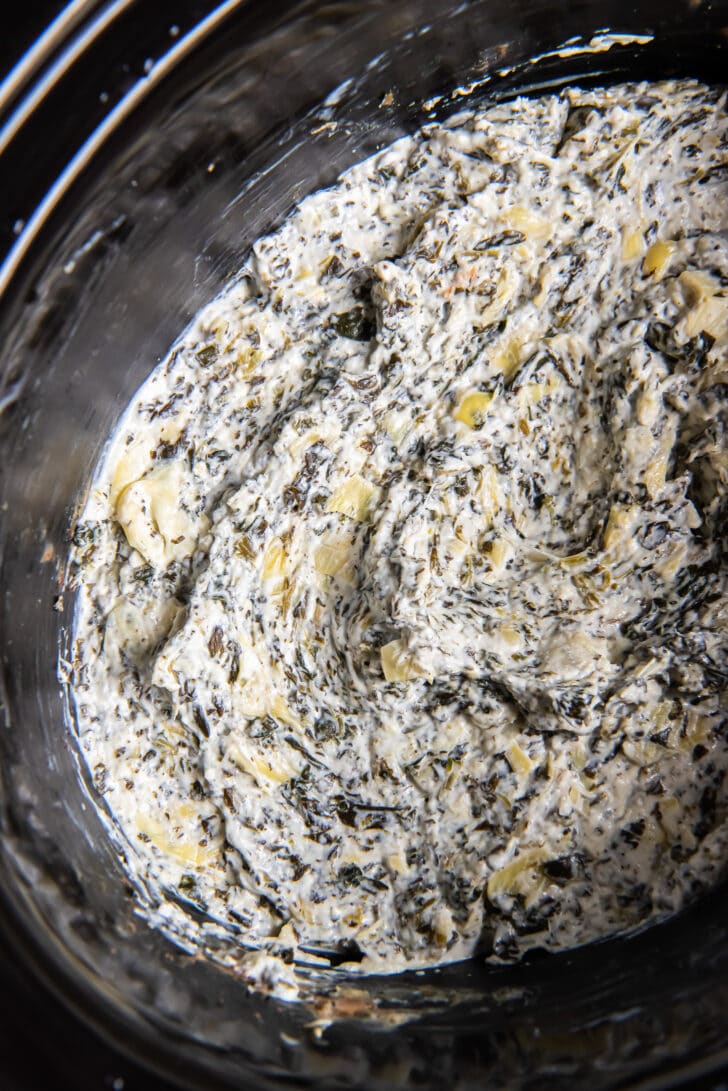 spinach artichoke dip in crockpot after cooking