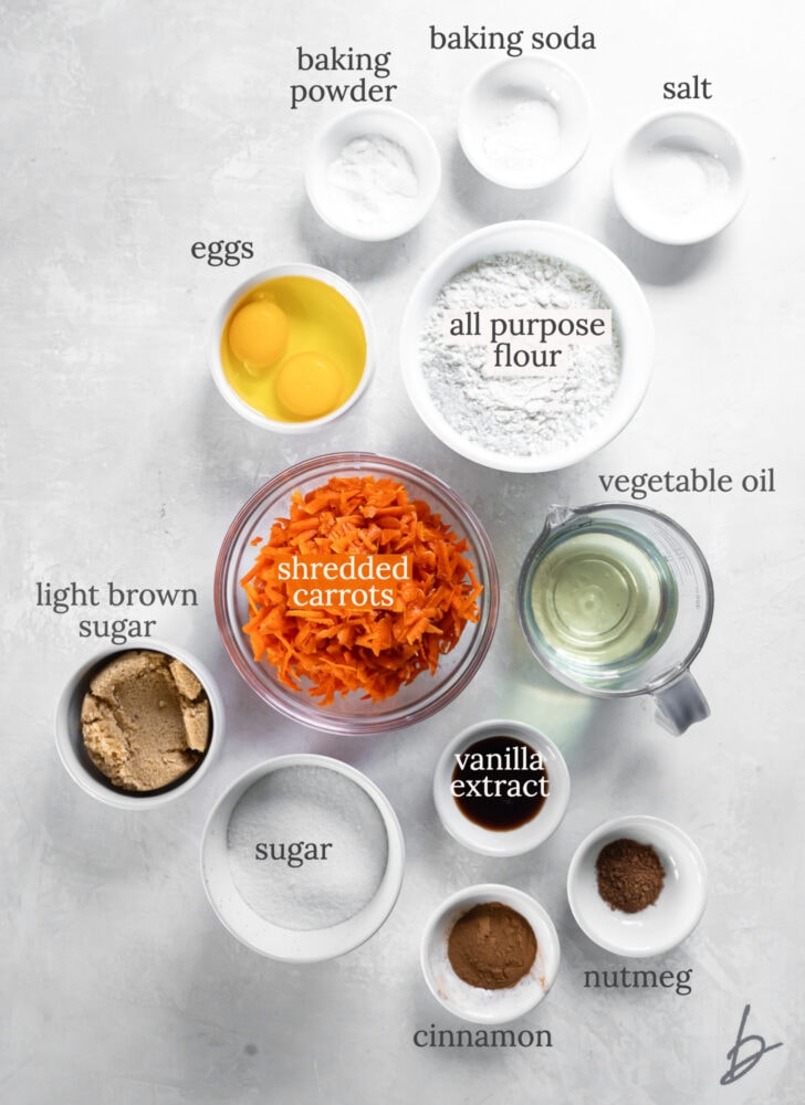 carrot cake donut ingredients in bowls labeled with text
