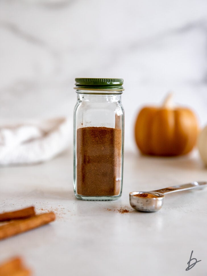 pumpkin pie spice in a glass spice jar