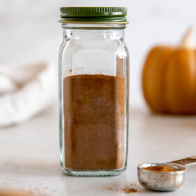 pumpkin pie spice in a glass spice jar