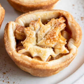 mini apple pie with leaf cut out top crust.