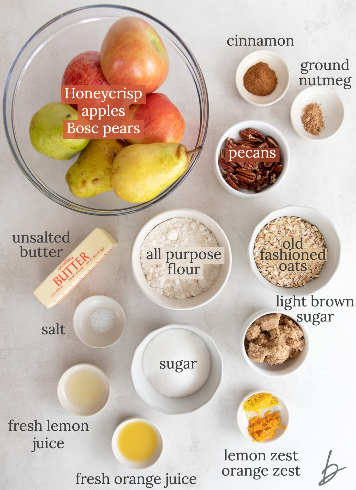 ingredients for apple pear crisp in bowls labeled with text.