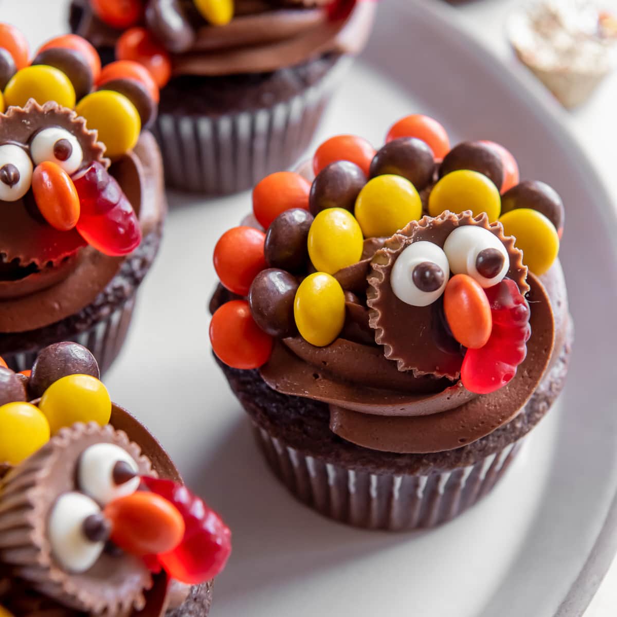 chocolate cupcake decorated with Reese's candy to look like a turkey.