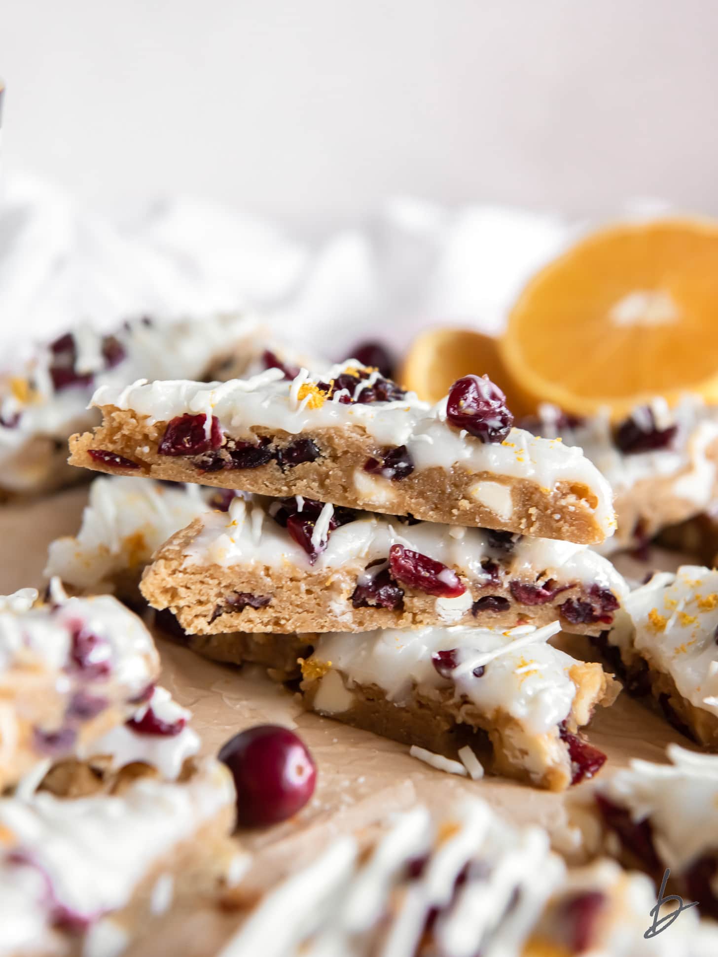 stack of three cranberry bliss bar triangles.