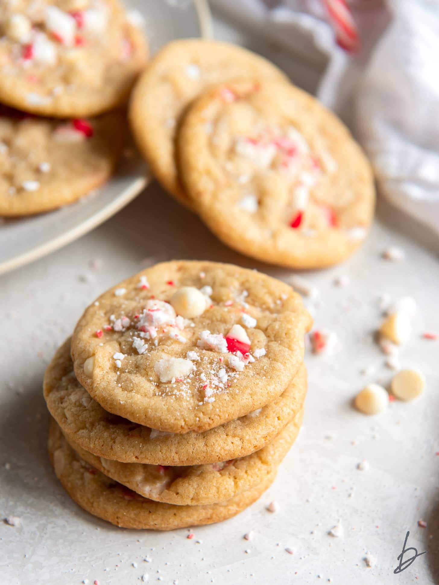 stack of four white chocolate chip peppermint cookies.