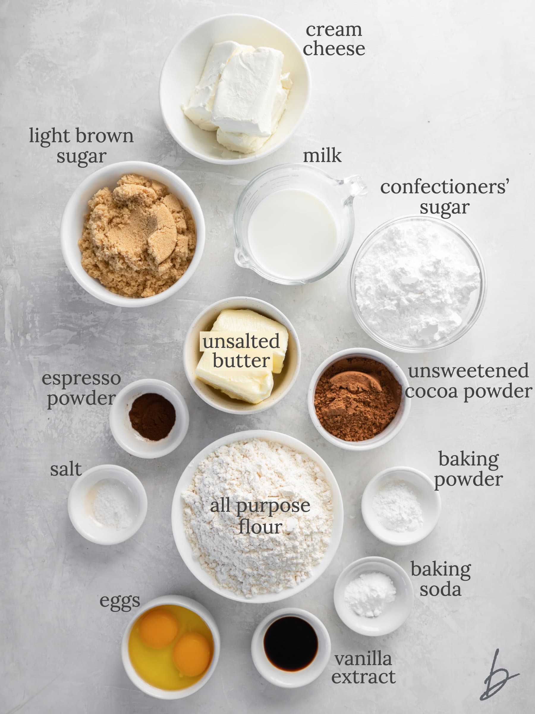 chocolate whoopie pie ingredients in bowls labeled with text.