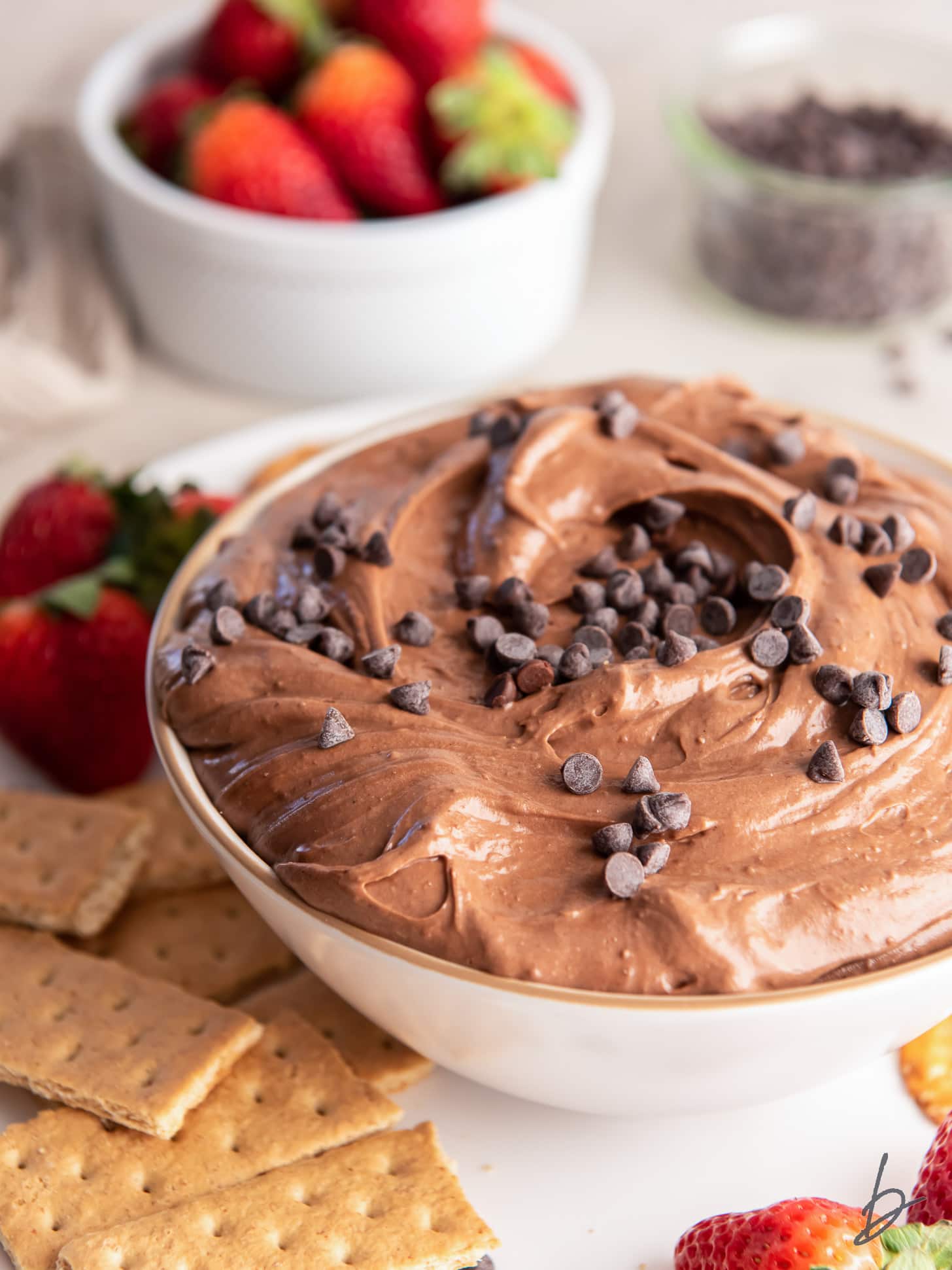 bowl of brownie batter dip with mini chocolate chips.