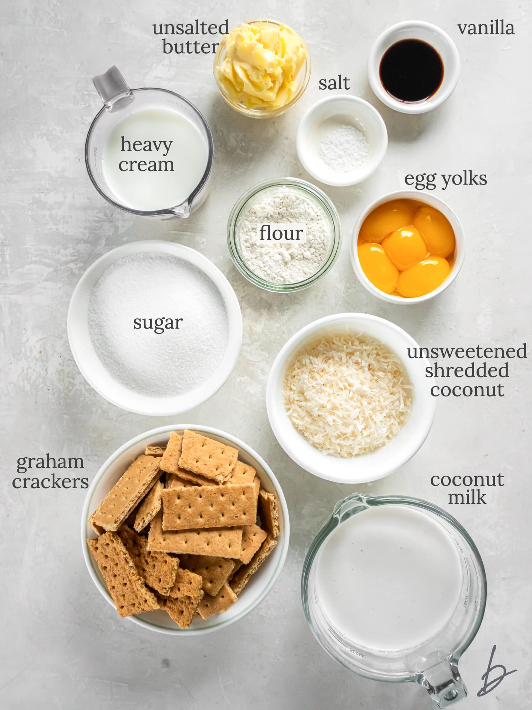 coconut cream pie ingredients in bowls labeled with text.