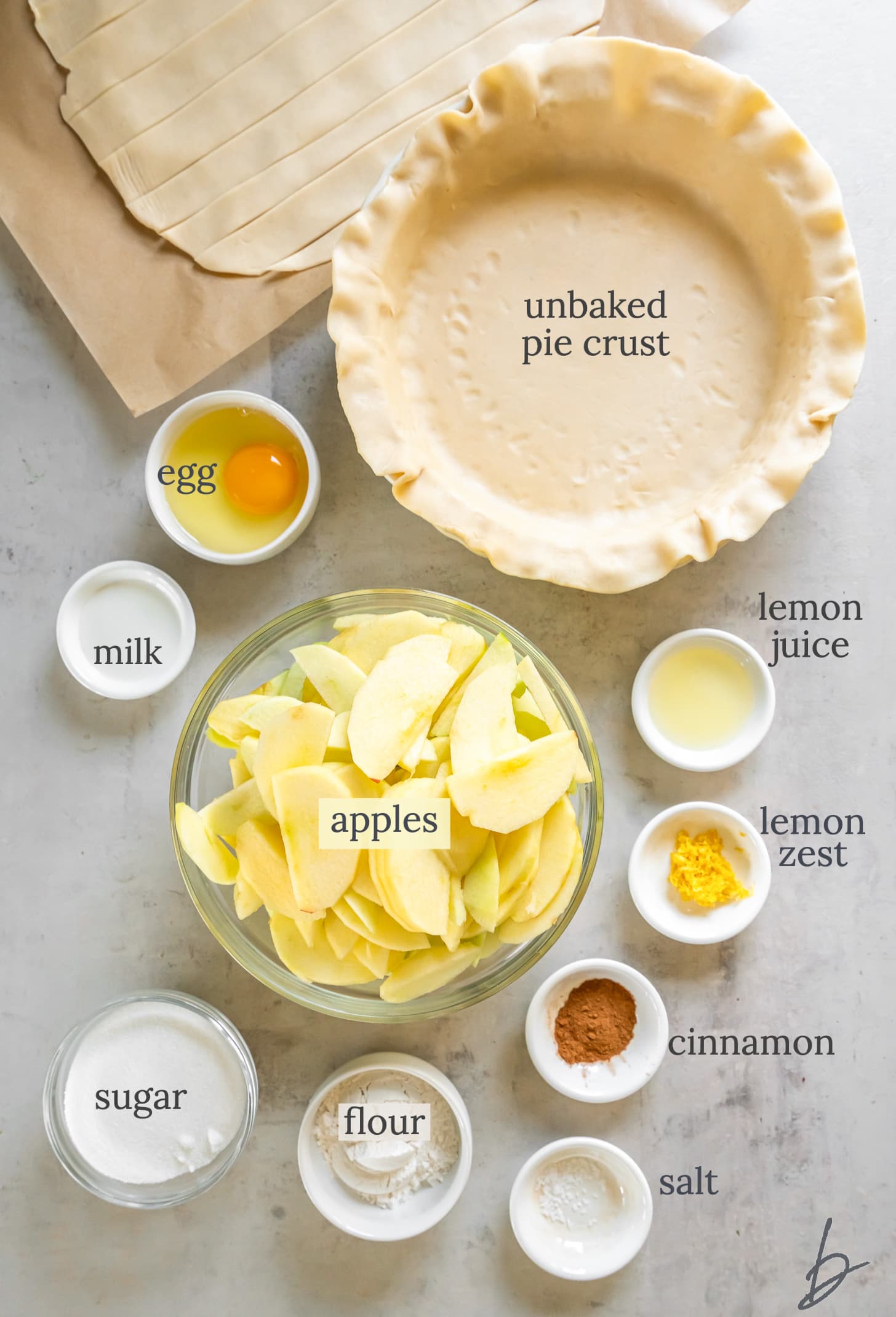 bowls of ingredients to make the best apple pie.