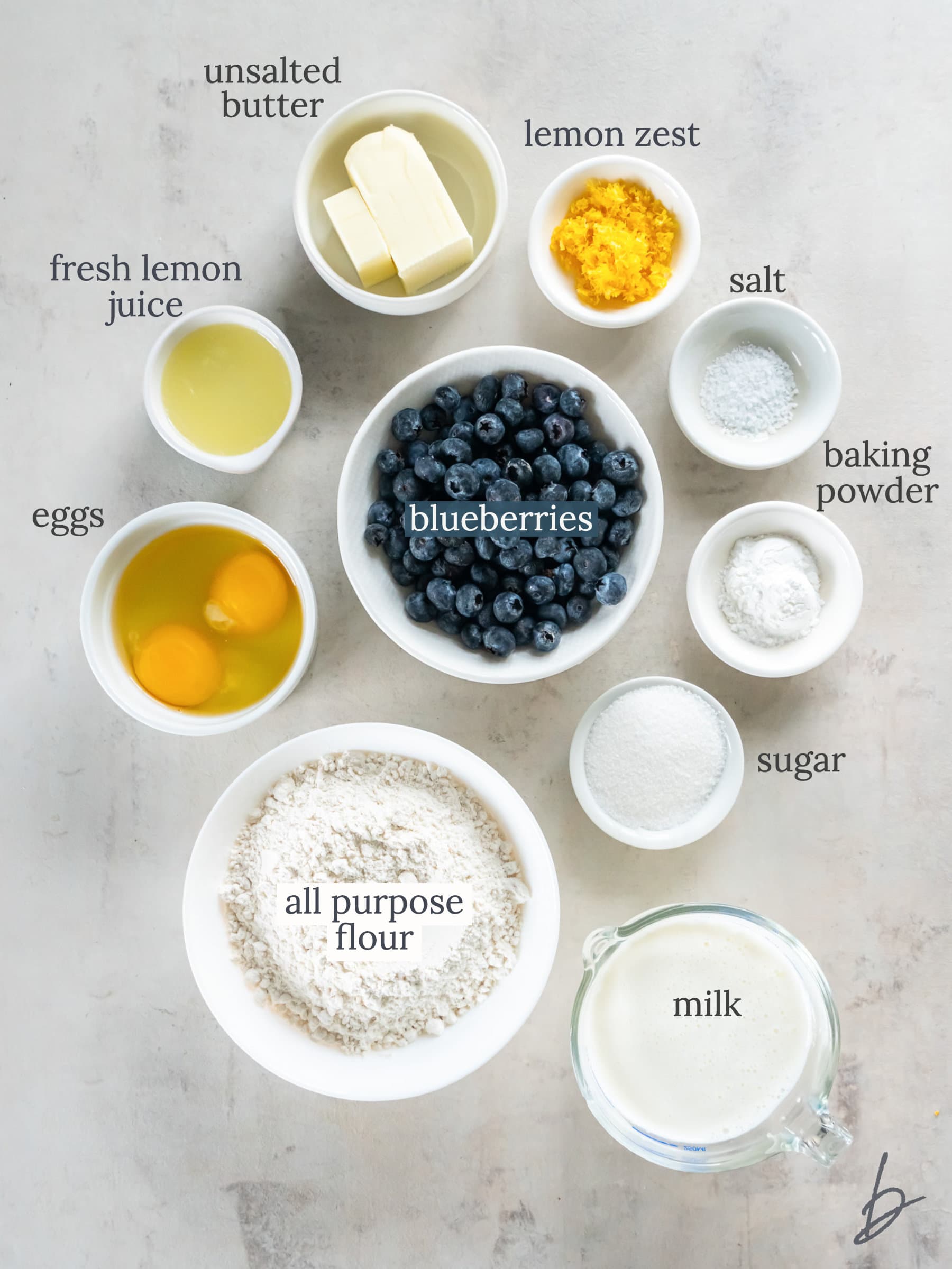 bowls of ingredients for make lemon blueberry pancakes.