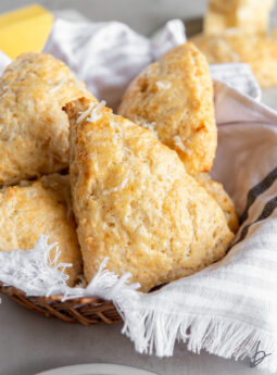 basket of cheddar cheese scones.