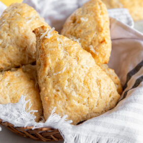 basket of cheddar cheese scones.