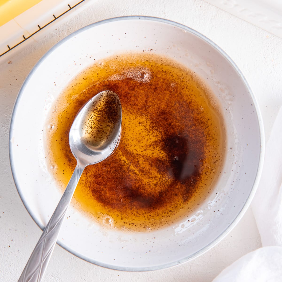 bowl of brown butter with a spoon.
