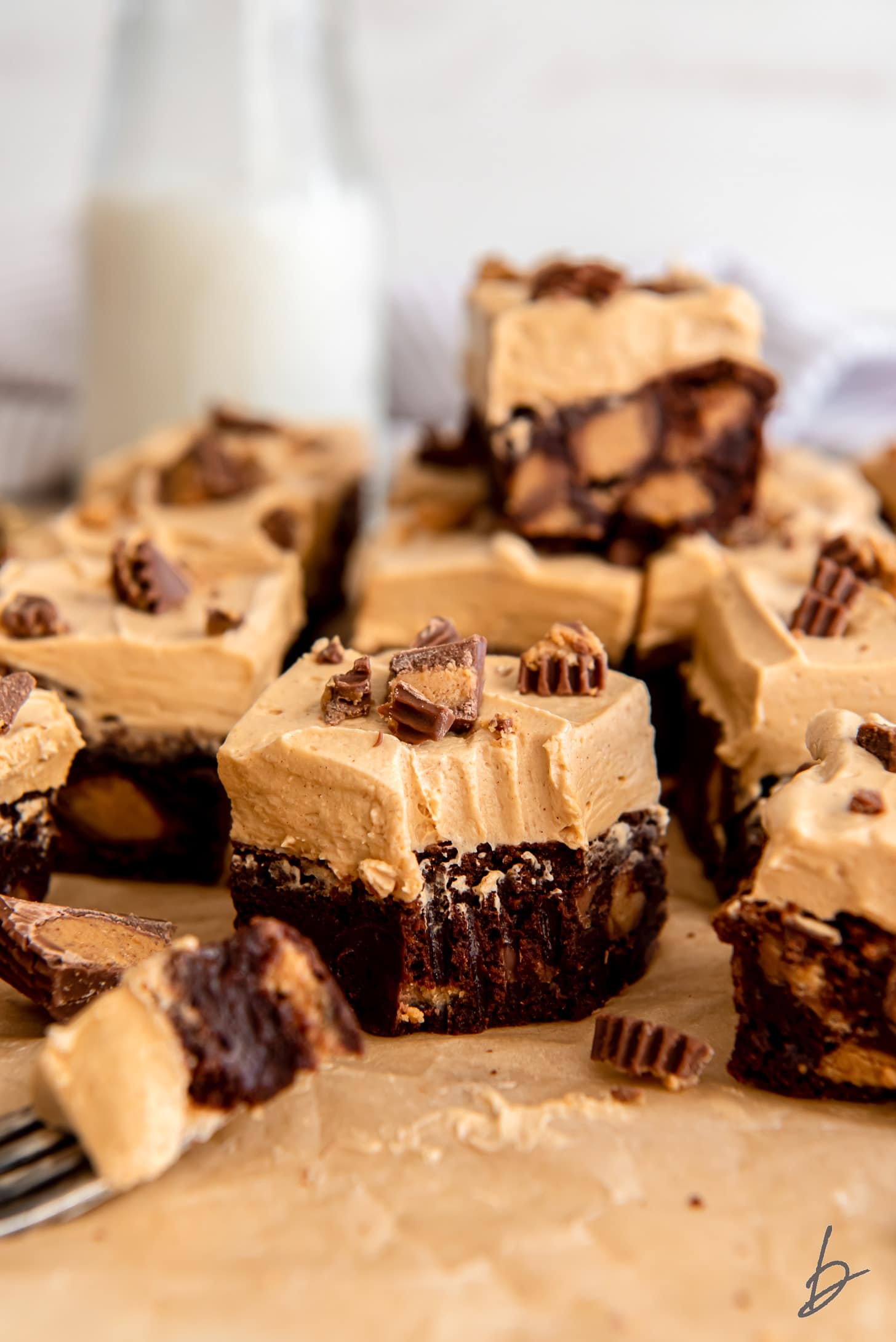 frosted peanut butter brownie with a bite taken off the corner.