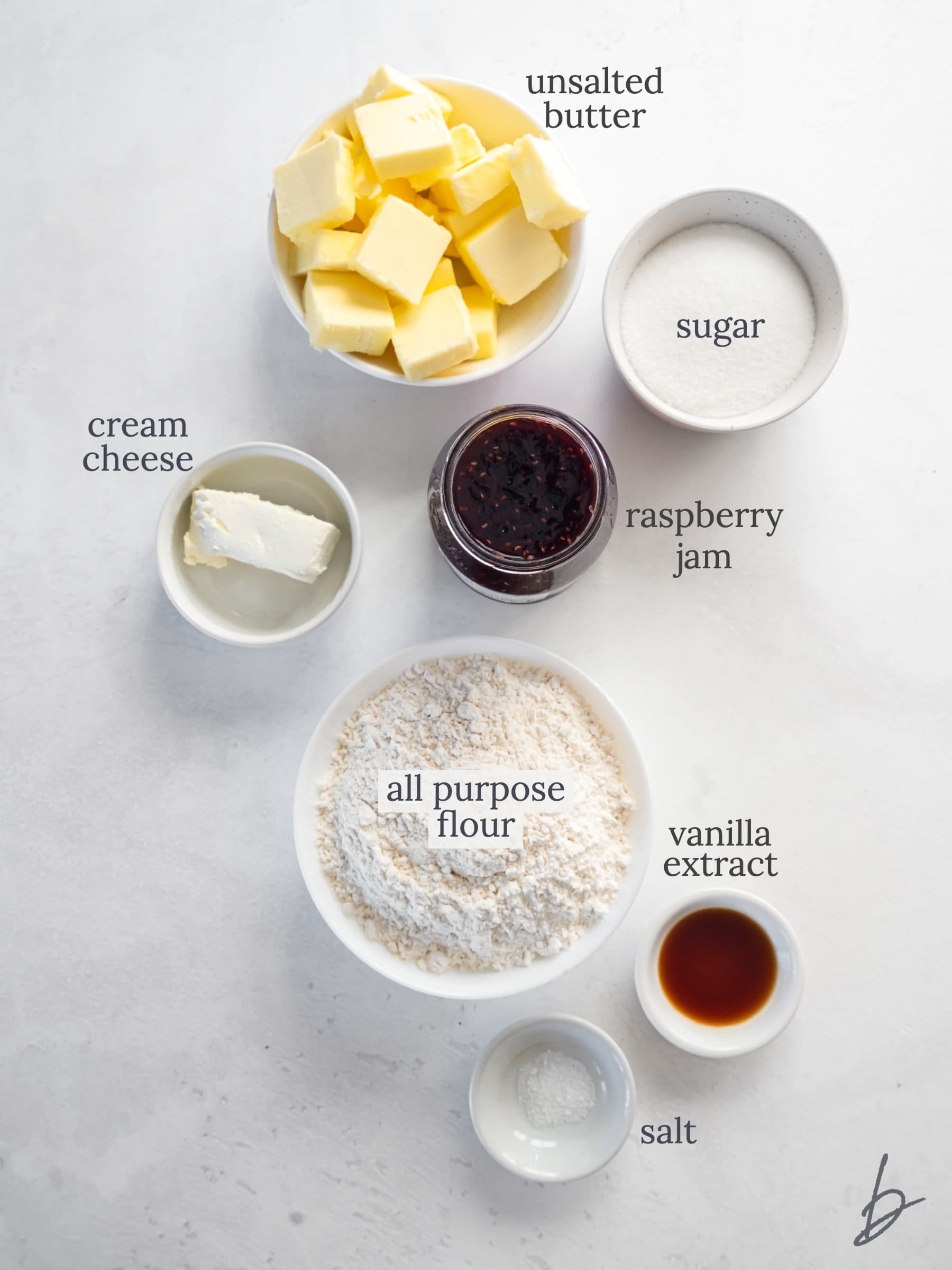 bowls of ingredients to make jam sandwich cookies.