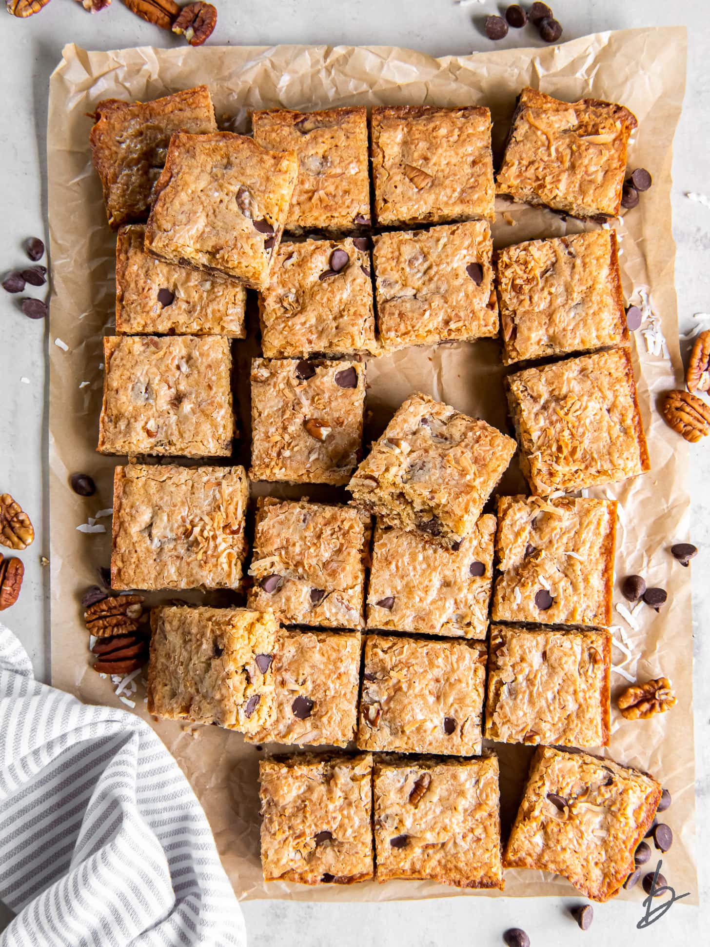 congo bars cut into squares on parchment paper.