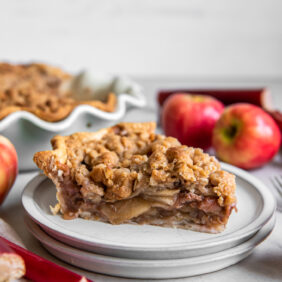 side of apple rhubarb pie slice showing layers.