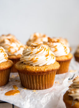 brown sugar cupcake with caramel frosting and caramel drizzle.
