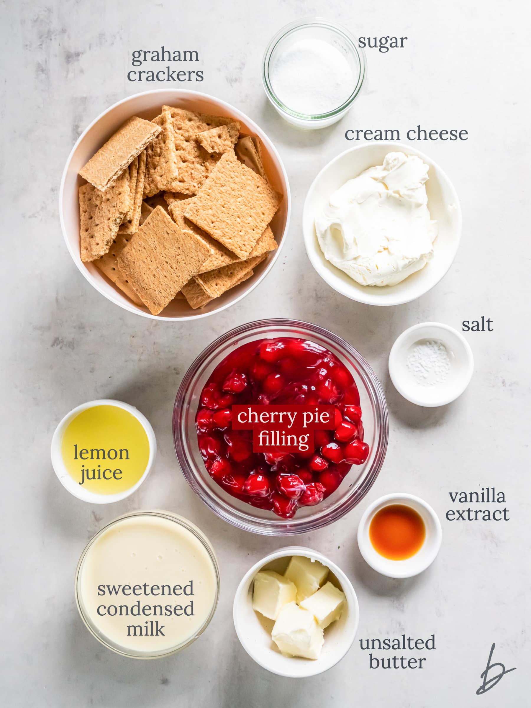 bowls of ingredients to make cherry cream cheese pie.