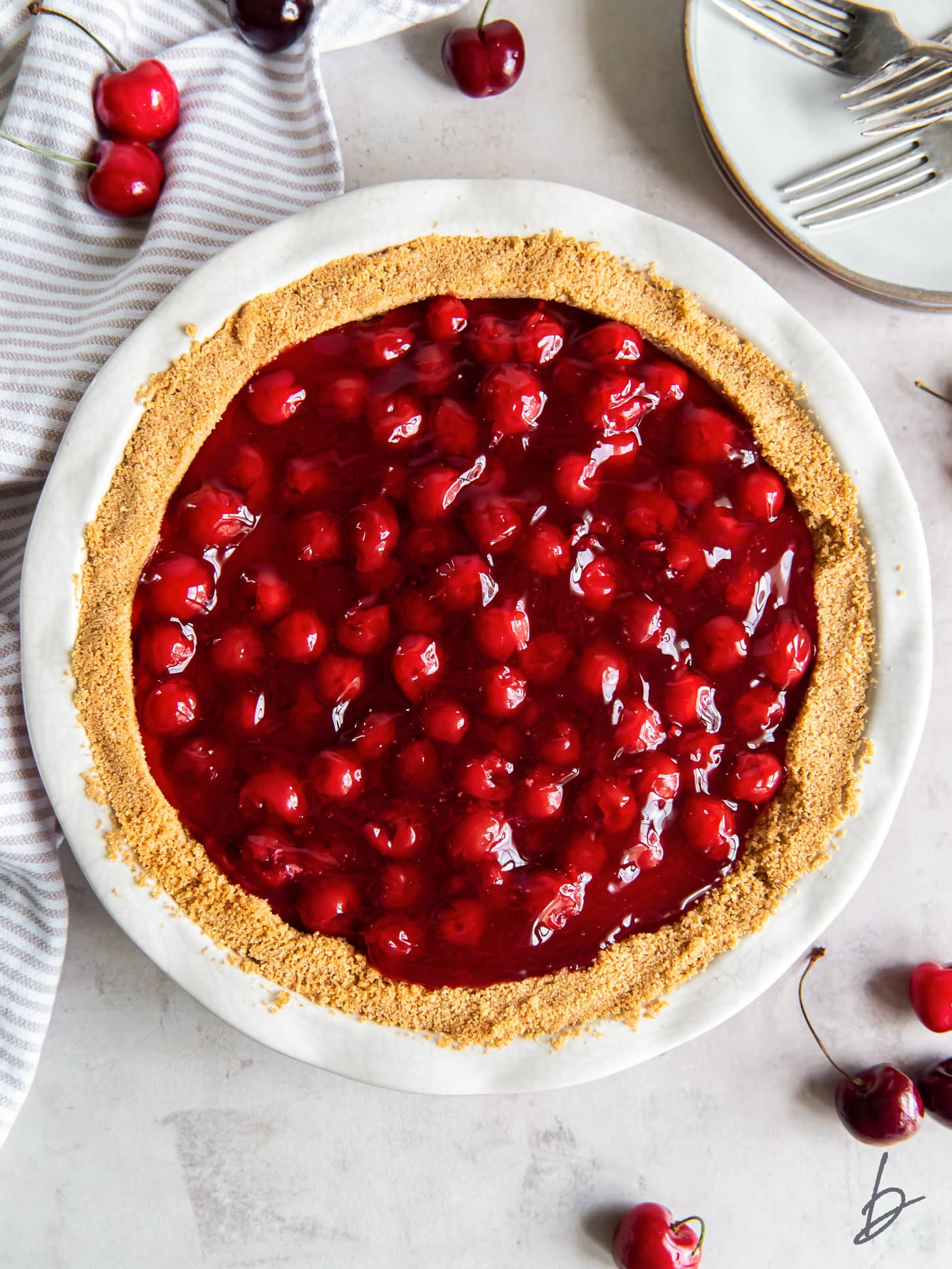 top of cherry cream cheese pie with graham cracker crust.