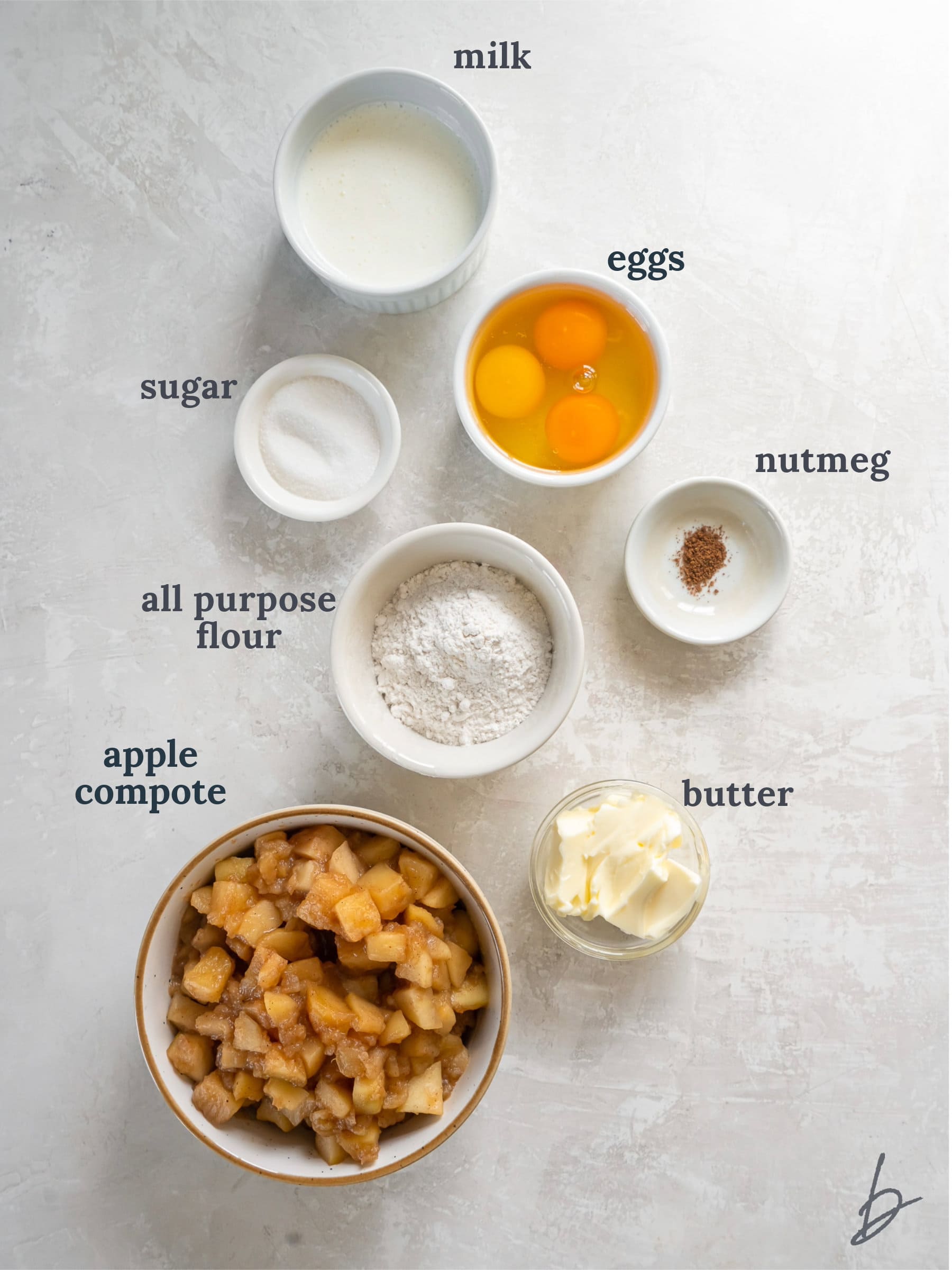 bowls of ingredients to make apple dutch baby.