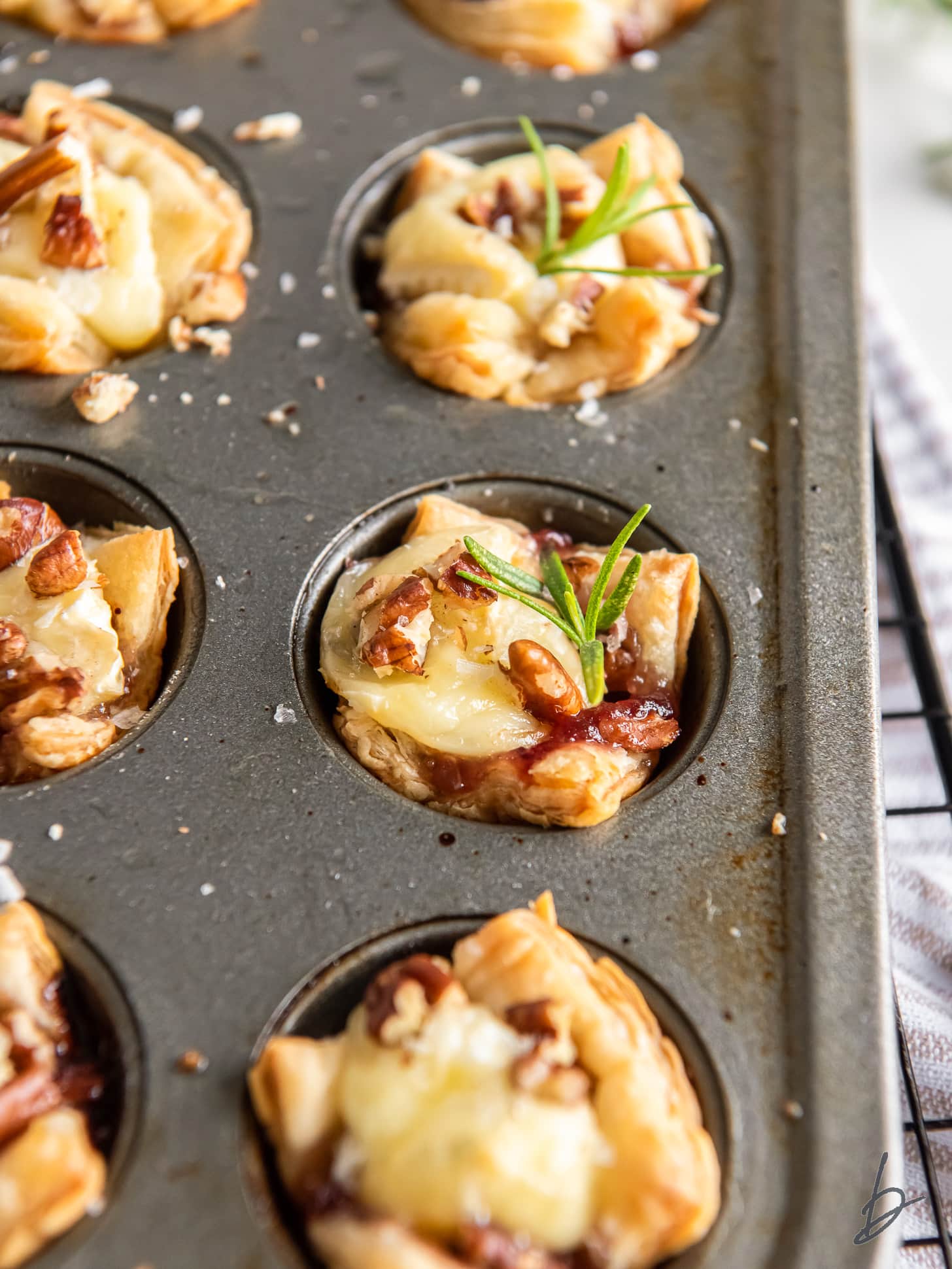 baked brie bites in a mini muffin tin.
