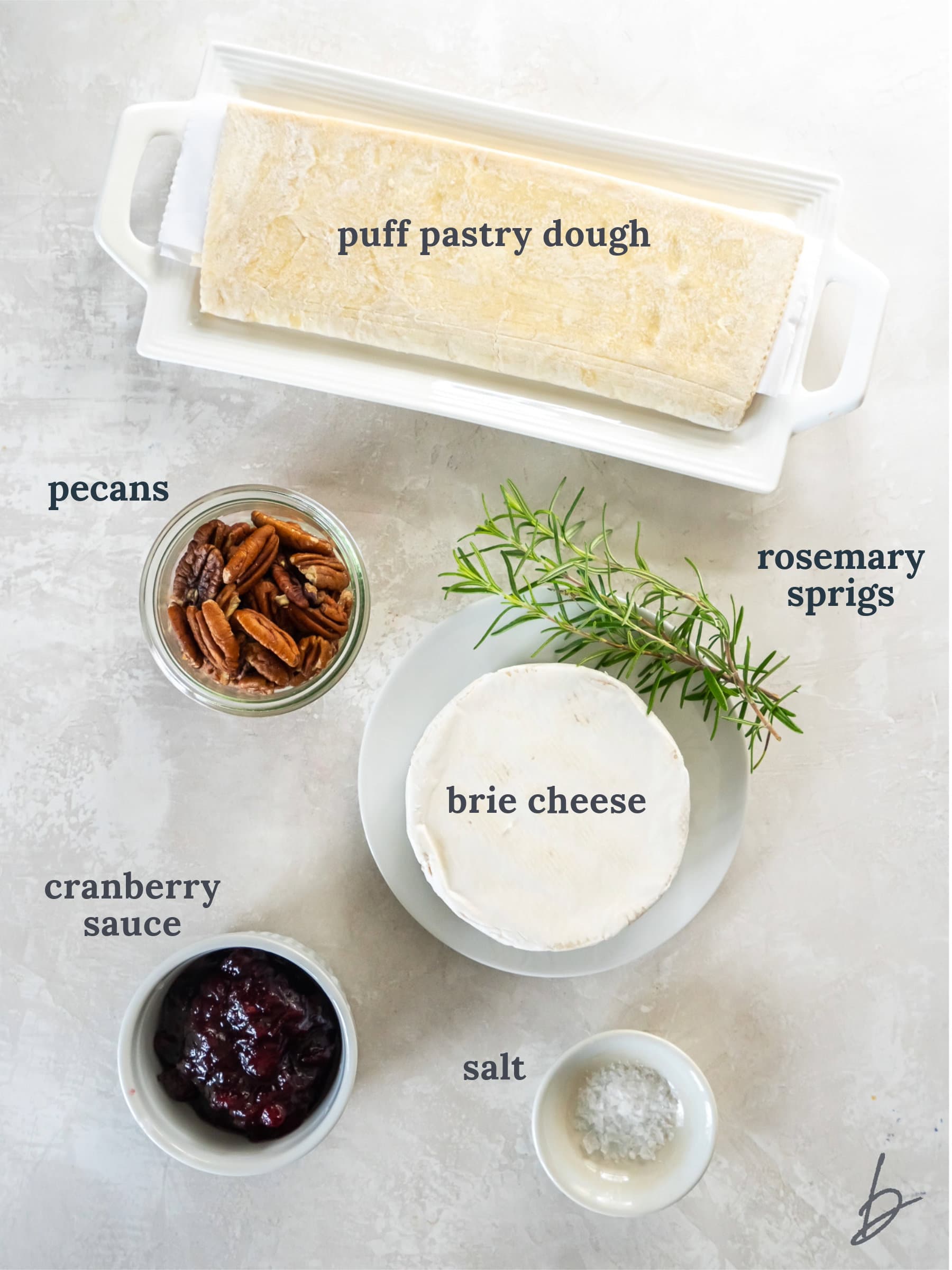 bowls of ingredients to make cranberry brie bites with puff pastry.