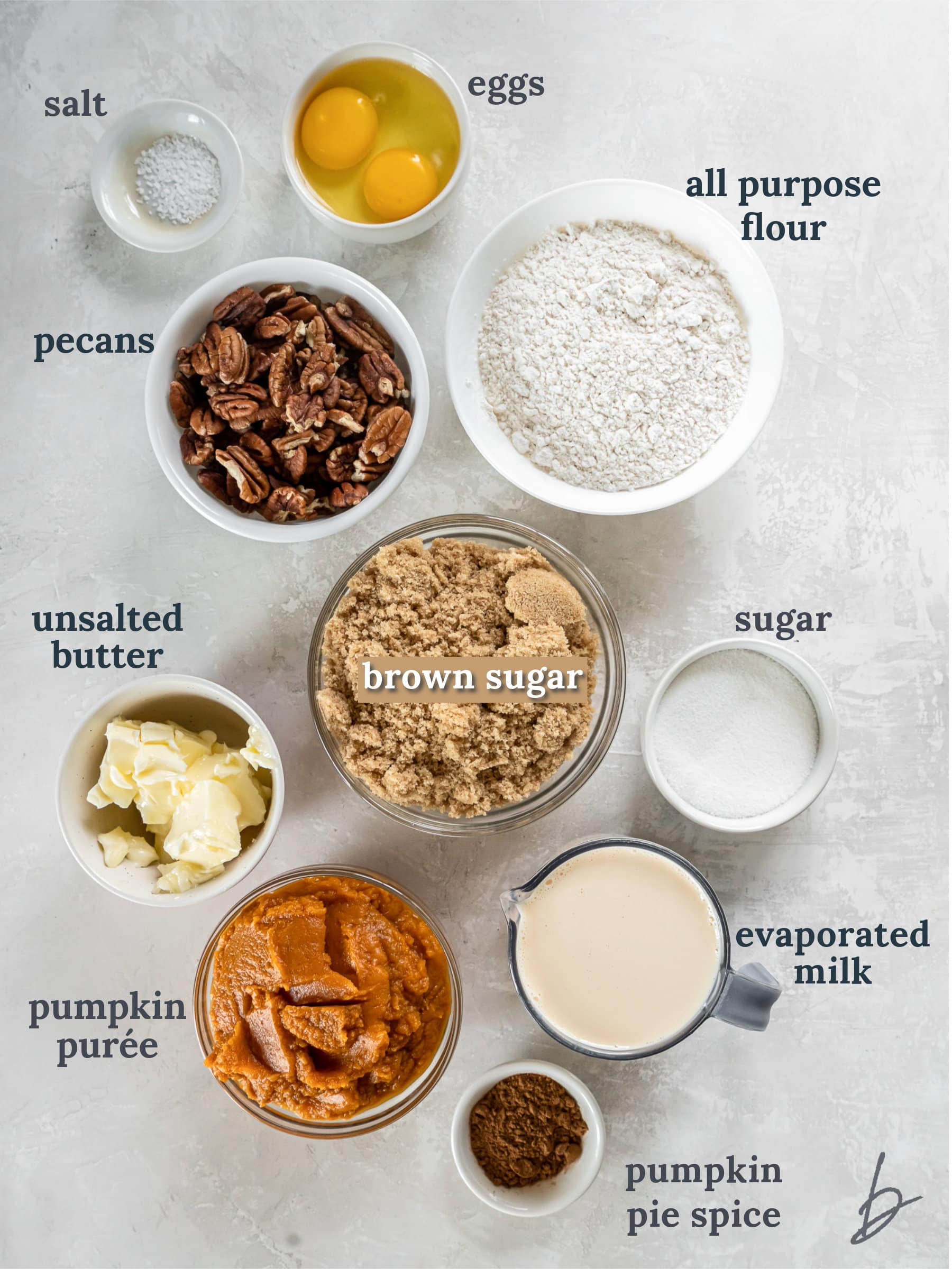 bowls of ingredients to make pumpkin pecan pie bars.
