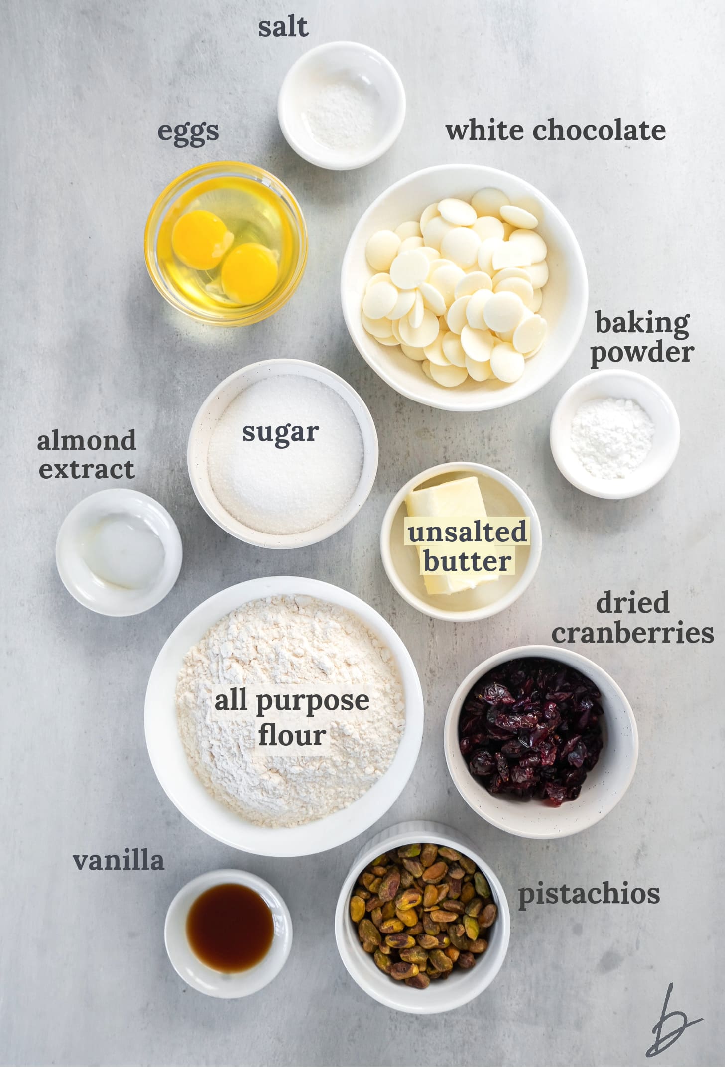 bowls of ingredients to make cranberry pistachio biscotti.