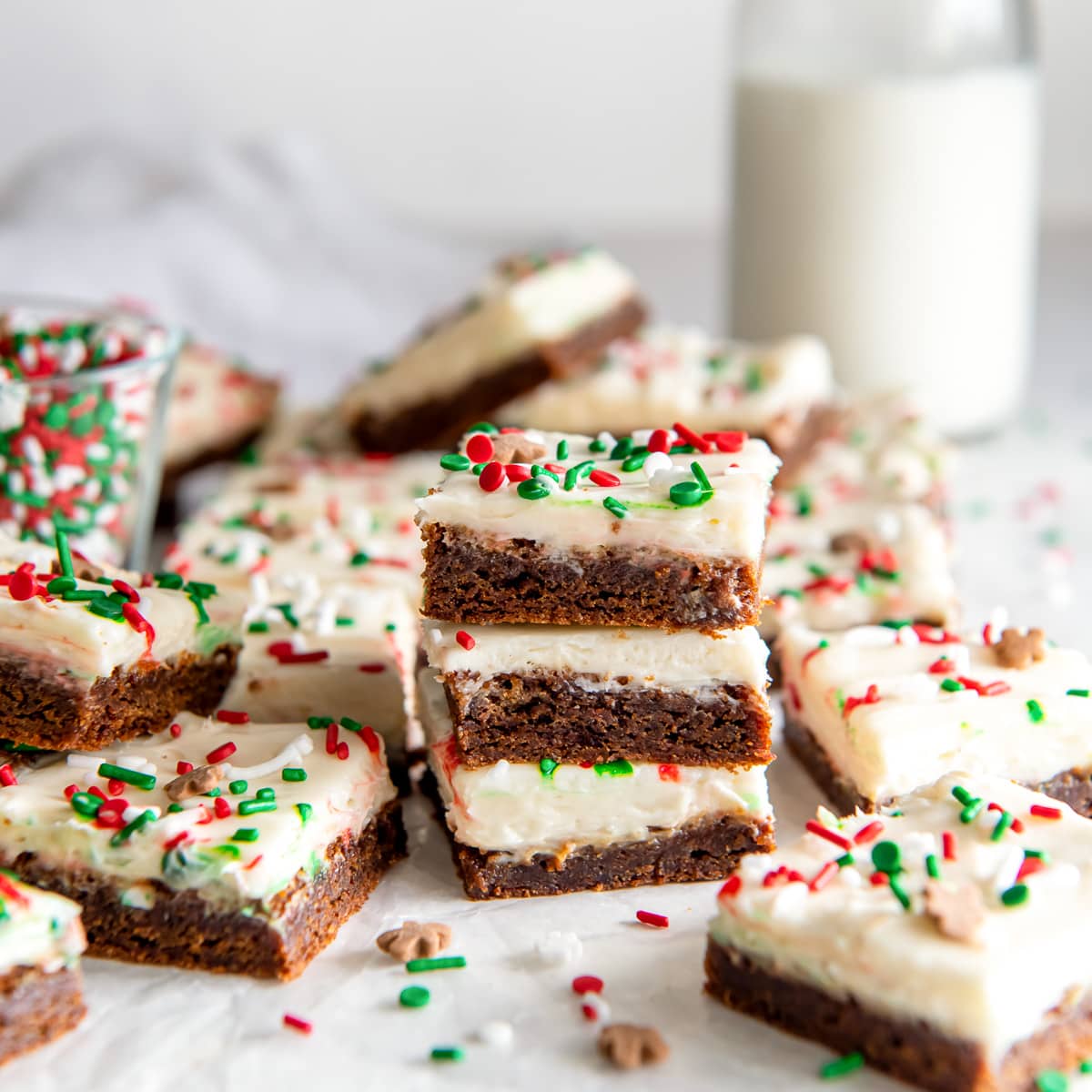stack of frosted gingerbread cookie bars with christmas sprinkles.