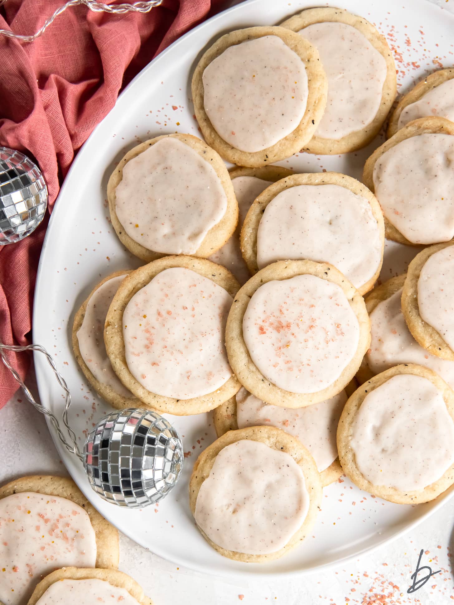 plate of taylor swift chai cookies with eggnog icing.