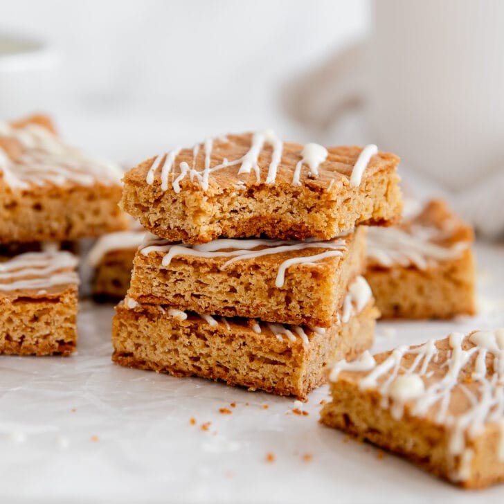 stack of chai blondies drizzled with white chocolate.