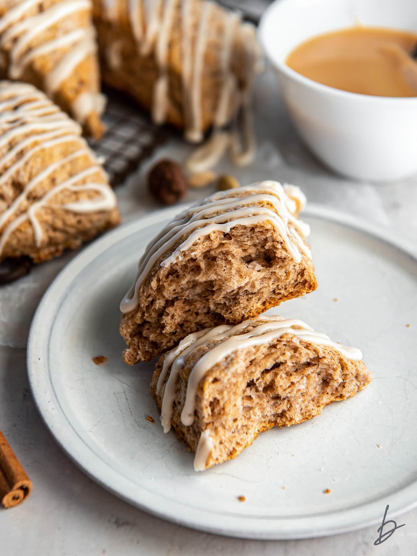 chai scone broken in half and stacked on top of each other to show flaky layers.