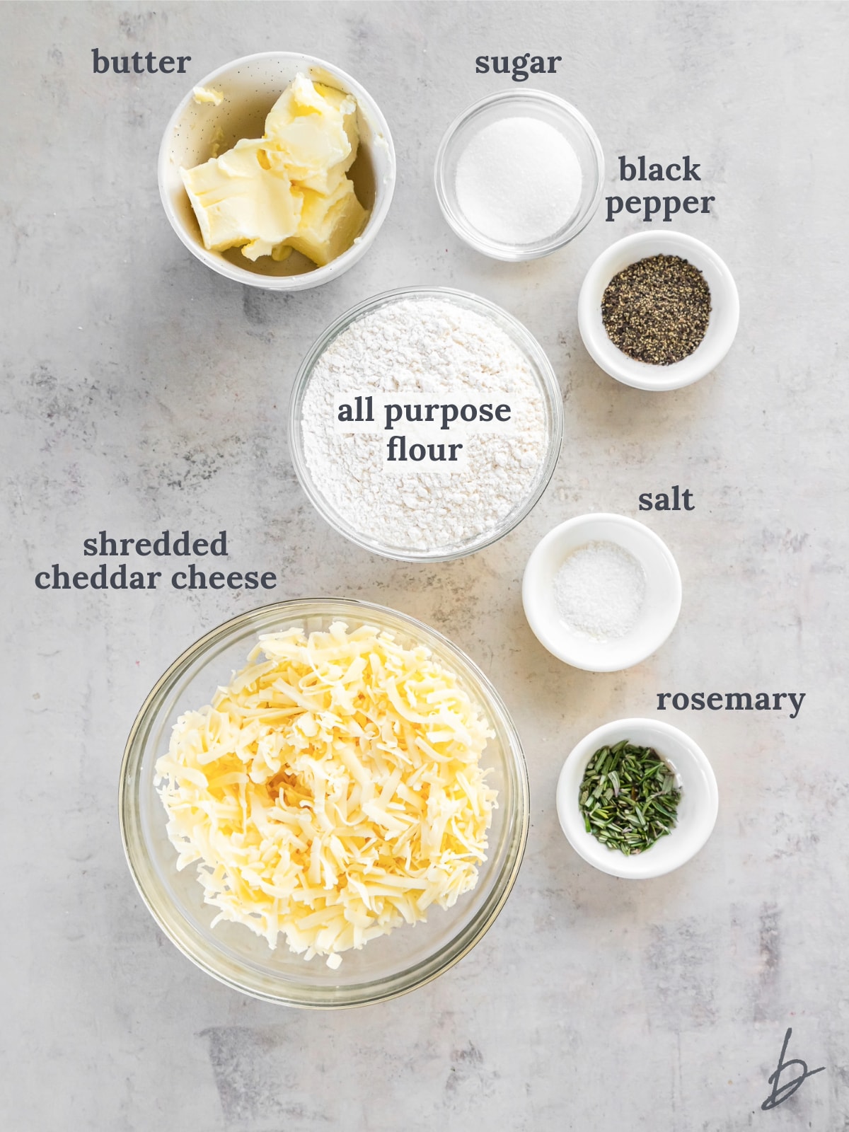 bowls of ingredients to make savory shortbread cookies.